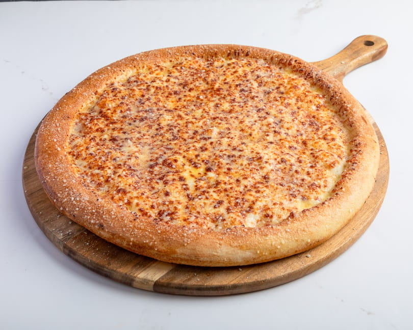 A whole cheese pizza with a thick, golden crust, sprinkled with salt, on a wooden serving board.