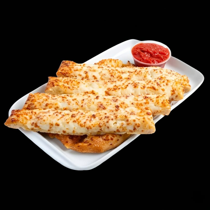 Cheesy breadsticks with a side of marinara sauce on a white rectangular plate.